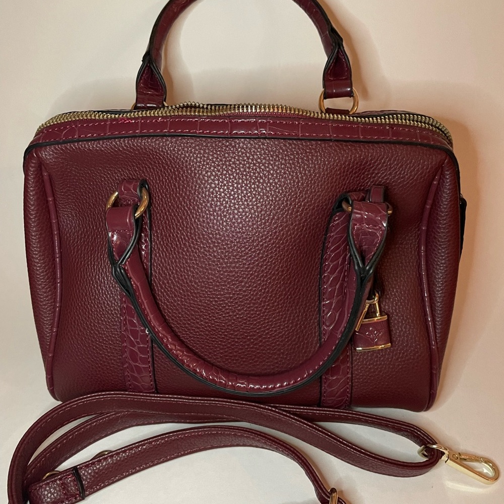 Brand New, never used beautiful Maroon Kelly and Katie purse 10 inch x 8 x 6 in